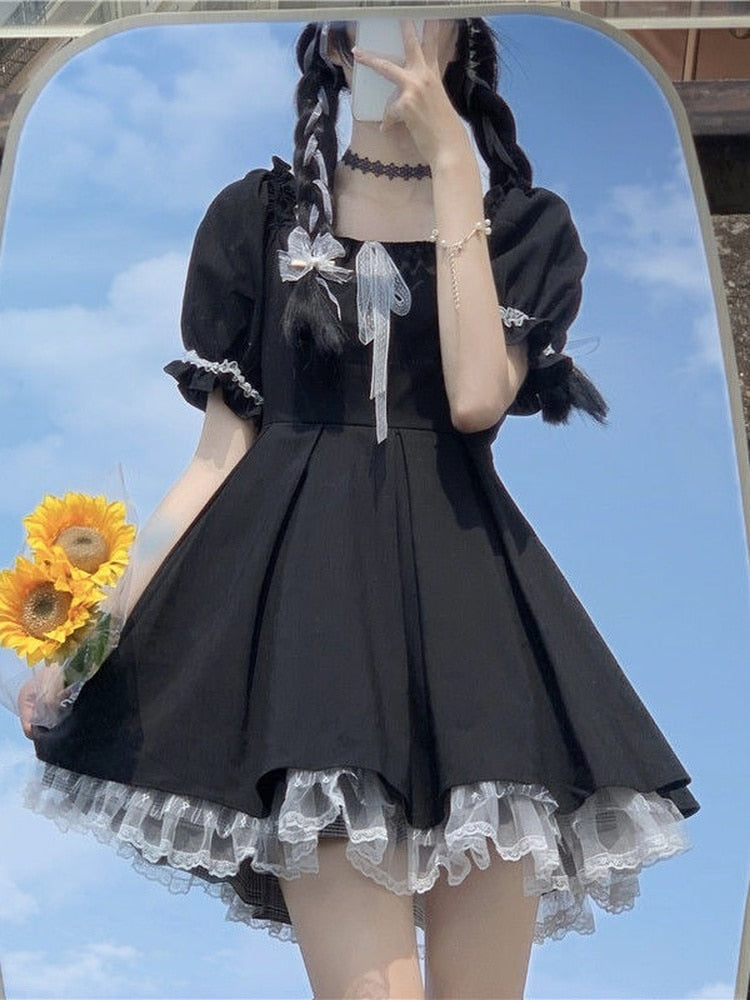 Vestido Negro de Encaje con Mangas Abullonadas